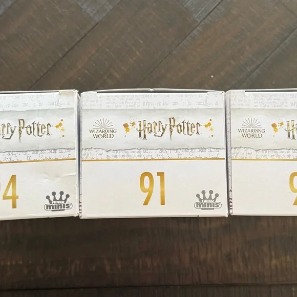 Funko Ron Weasley Vinyl Figure with Gold Accents and Red-Brown Hat - Picture 5 of 6